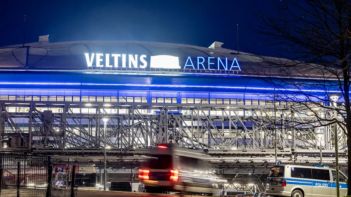 The Veltins Arena on Schalke in the dark, the police with forces in front of the stadium during the Revierderby.