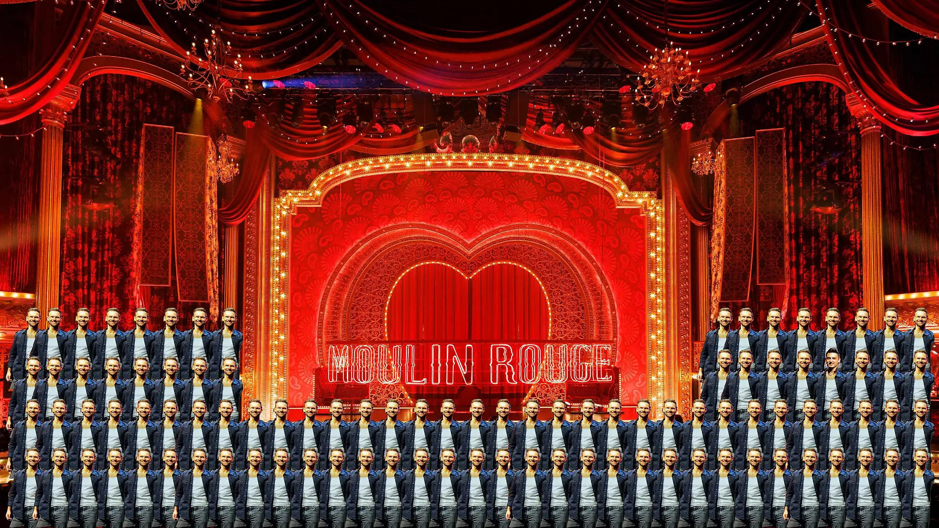Die Darsteller des Musical 'Moulin Rouge! Das Musical' zeigen kleine Ausschnitte aus der Show die in Kürze im Kölner Musical Dome Premiere feiert. Das Bühnenbild ist in Rot gehalten und von einer roten Windmühle und einem blauen Elefanten gesäumt. Köln, 03.11.2022