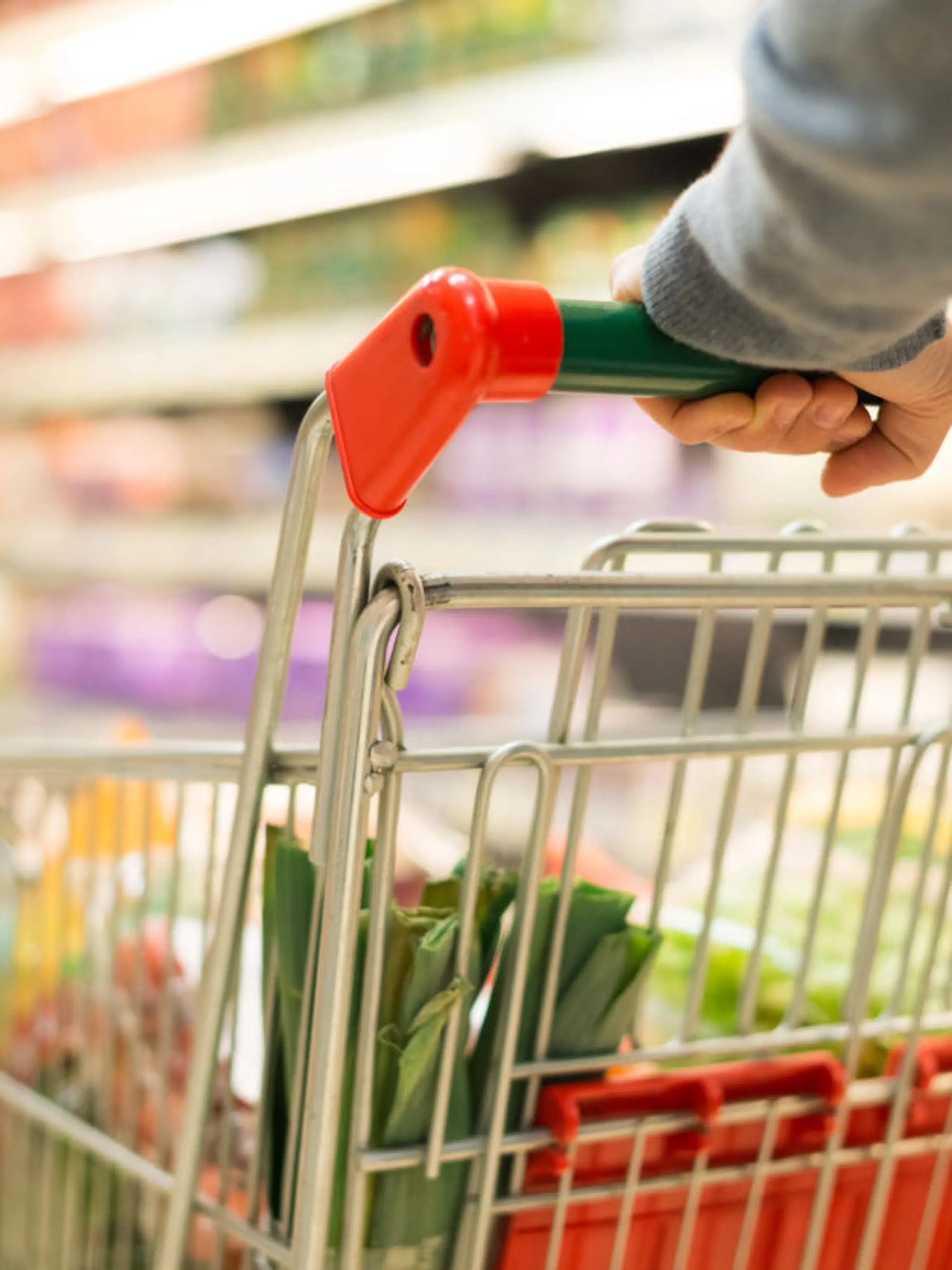 Close-up detail of a man shopping in a supermarket
