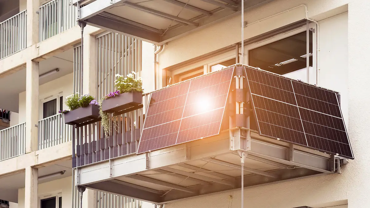 Solar Panel on Balcony Flat or Apartment Building. Solar Modern Balcony with Sun Light Reflection in Green City. Solar Technology Equipment. Green Energy Concept.