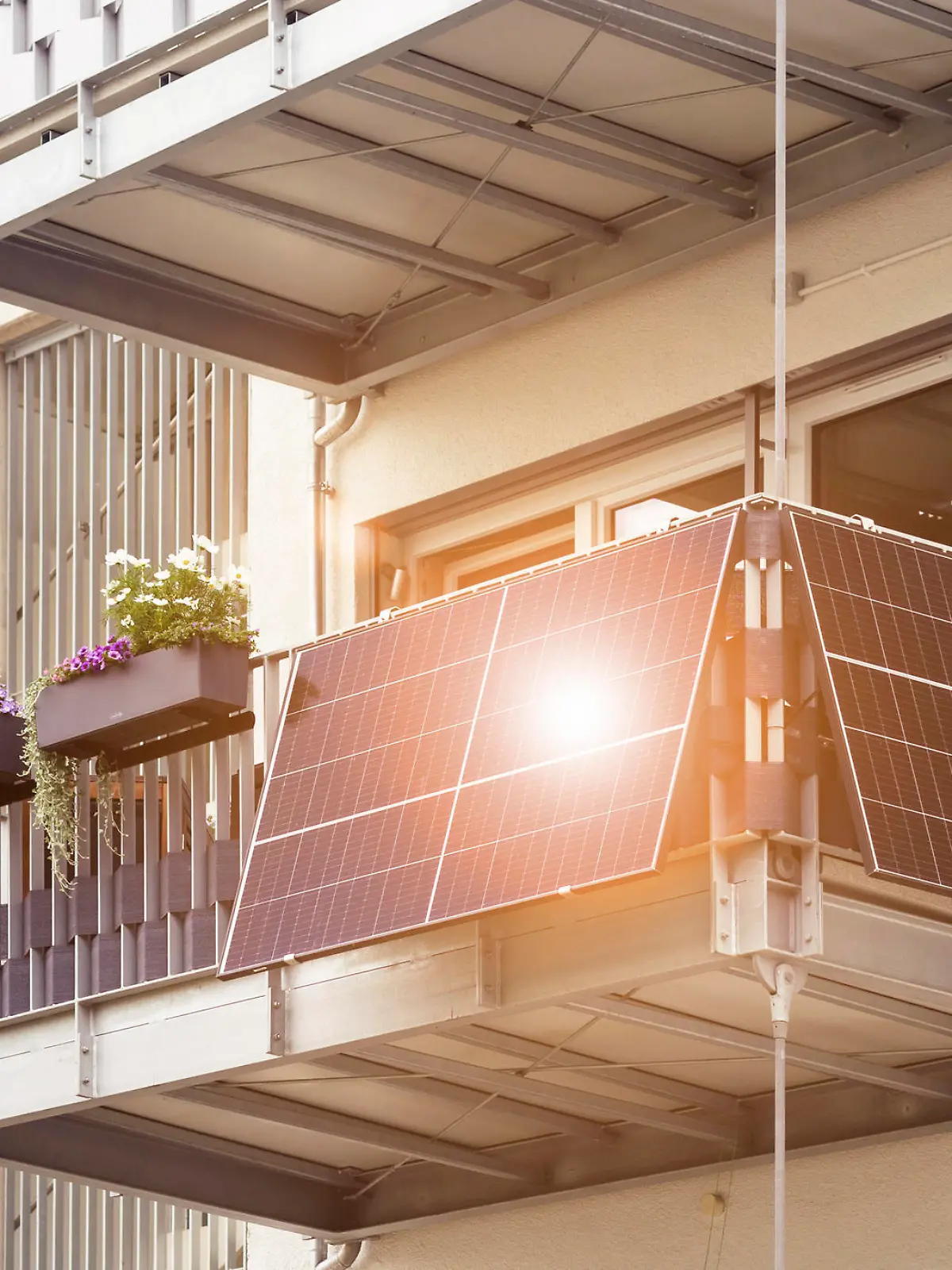 Solar Panel on Balcony Flat or Apartment Building. Solar Modern Balcony with Sun Light Reflection in Green City. Solar Technology Equipment. Green Energy Concept.