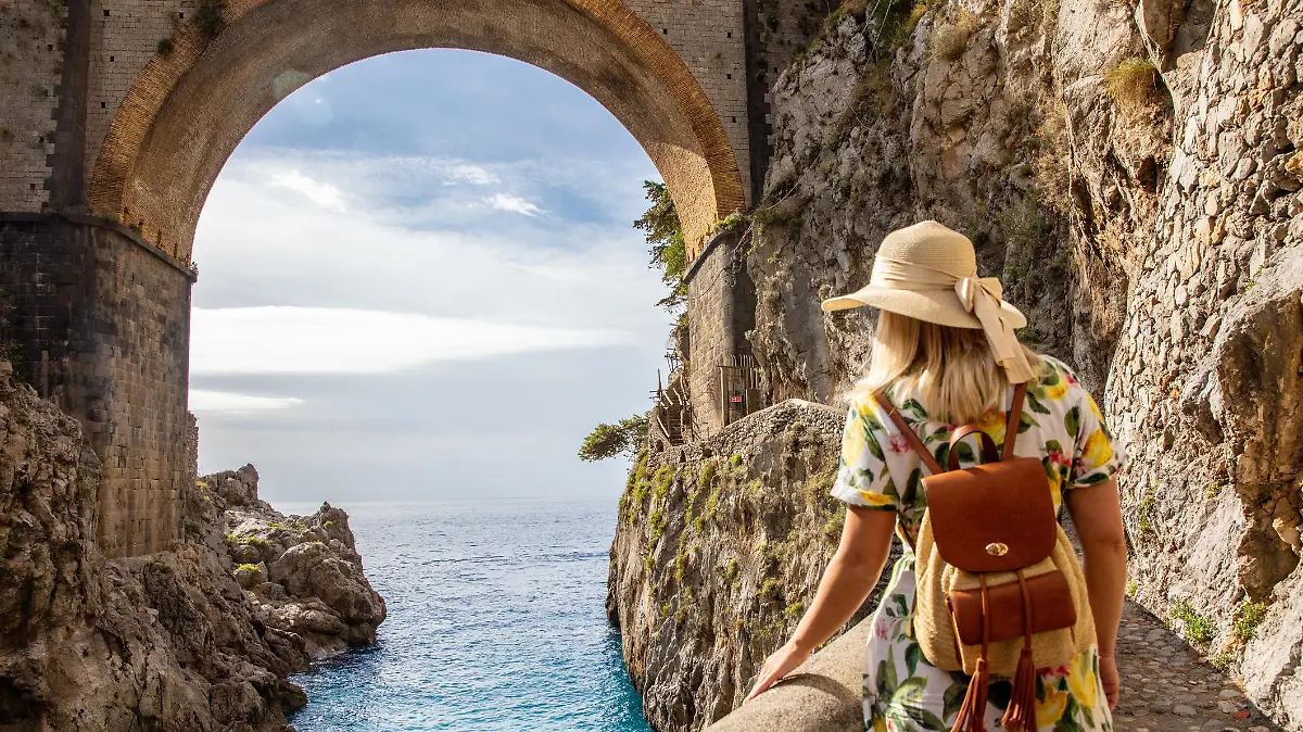 Young Woman At Famous Fiordo Di Furore Bridge,Positano,Amalfi Coast,Italy