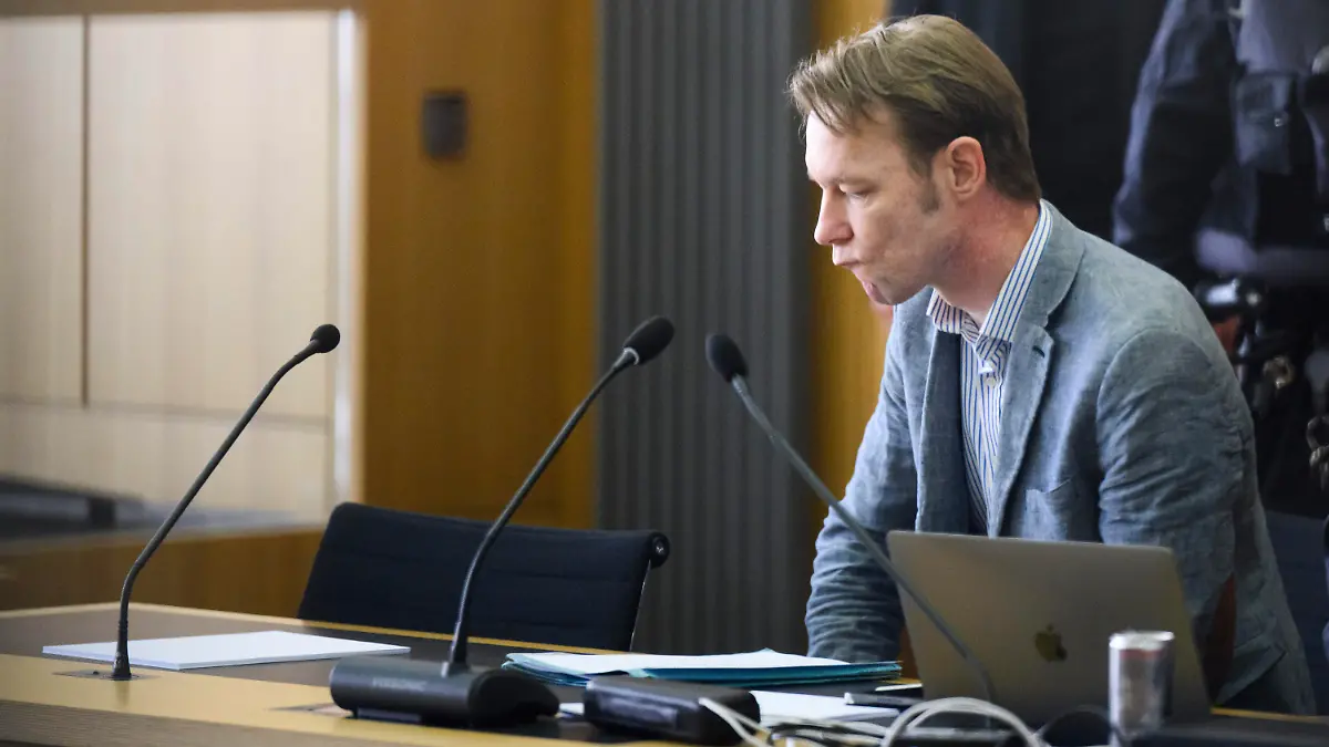 The accused Christian B. sits in the courtroom at Braunschweig Regional Court in Brunswick, Germany, Wednesday May 15, 2024. Christian B. is accused of three cases of aggravated rape and two cases of sexual abuse of children in Portugal. Investigators also suspect the German in the Maddie case. (Julian Stratenschulte/Pool via AP)