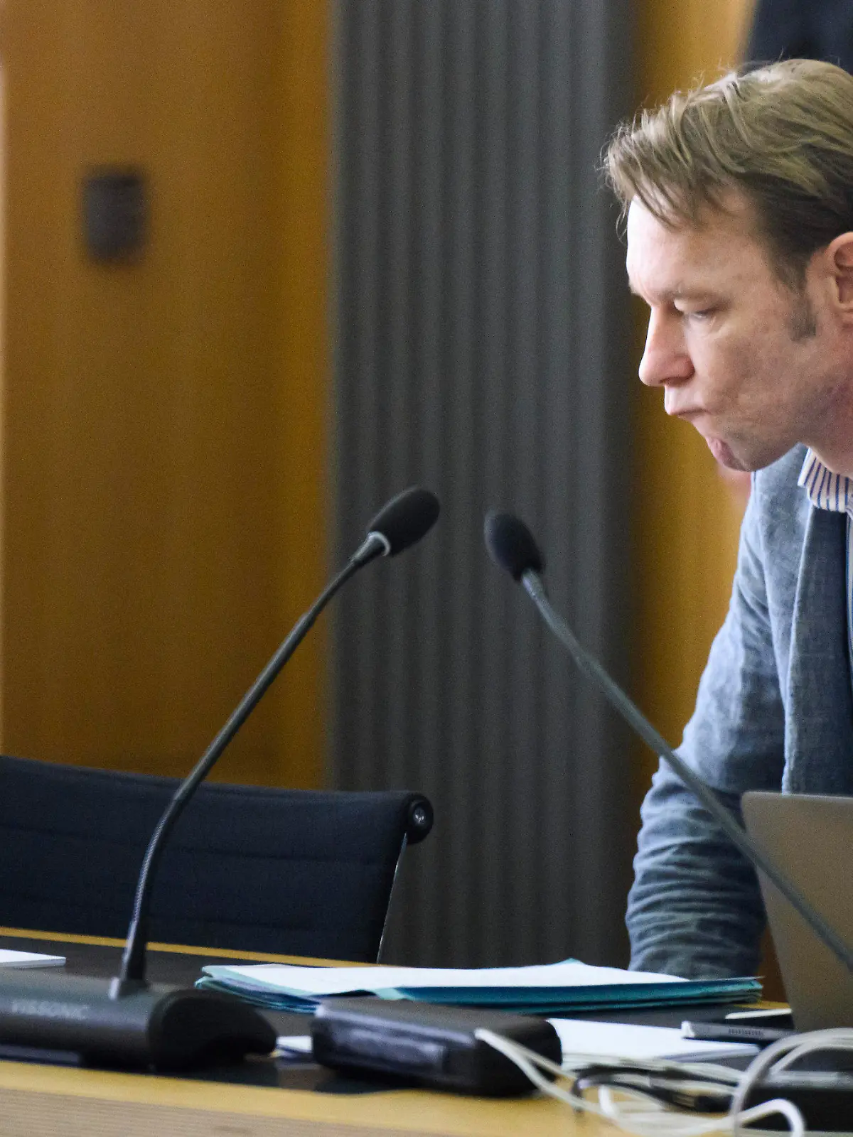 The accused Christian B. sits in the courtroom at Braunschweig Regional Court in Brunswick, Germany, Wednesday May 15, 2024. Christian B. is accused of three cases of aggravated rape and two cases of sexual abuse of children in Portugal. Investigators also suspect the German in the Maddie case. (Julian Stratenschulte/Pool via AP)