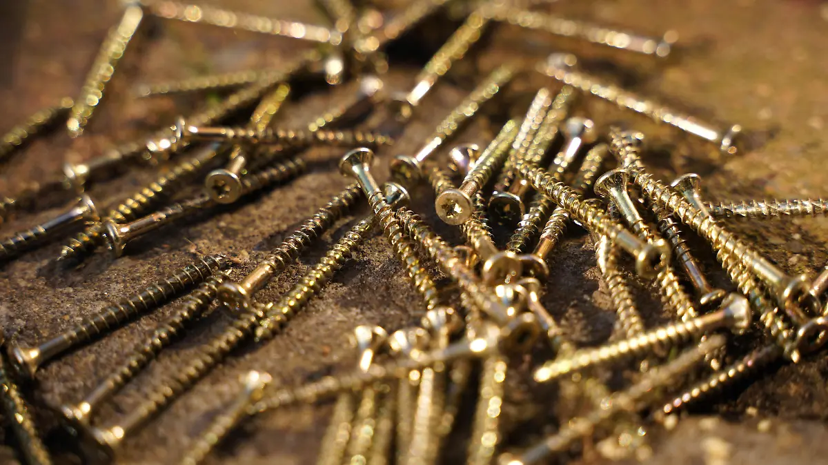 Torx screws laying on the floor, ready to be used