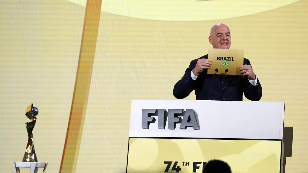 FIFA President Gianni Infantino unveils Brazil as the winner of the bid to host the Women's World Cup, during the 74th FIFA Congress at the Queen Sirikit National Convention Center in Bangkok, Thailand, May 17, 2024. REUTERS/Chalinee Thirasupa