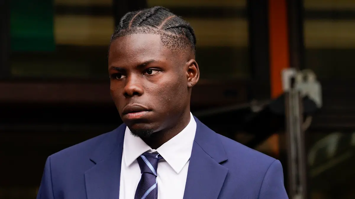 Yoan Zouma, brother of West Ham United player Kurt Zouma, leaves Thames Magistrates Court in London, Tuesday, May 24, 2022. Kurt Zouma has pleaded guilty to kicking and slapping his pet cat in abuse caught on video. The 27-year-old France international appeared at the hearing accused of three offenses under the Animal Welfare Act in relation to footage of the abuse that surfaced on social media in February. Kurt Zouma pleaded guilty to two counts of causing unnecessary suffering to a protected animal. (AP Photo/Alberto Pezzali)