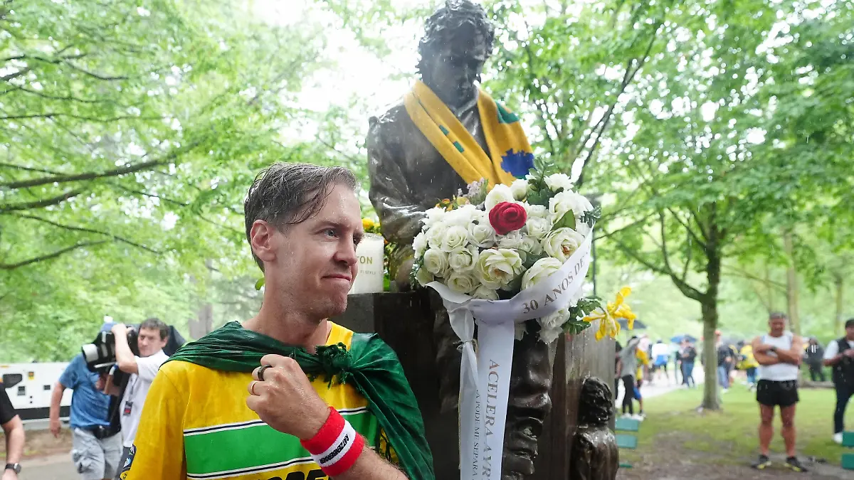 Emilia Romagna Grand Prix - Paddock Day - Autodromo Internazionale Enzo e Dino Ferrari. Sebastian Vettel at the Ayrton Senna Memorial at the Autodromo Internazionale Enzo e Dino Ferrari circuit in Italy. It is 30 years since the Brazilians career was cut short when he died at the 1994 San Marino Grand Prix, aged 34. Senna contested 161 Formula One races, winning 41 of them, and taking three world championships. Picture date: Thursday May 16, 2024. See PA story AUTO Emilia Romagna. Photo credit should read: David Davies/PA Wire. RESTRICTIONS: Use subject to restrictions. Editorial use only, no commercial use without prior consent from rights holder. URN:76194494