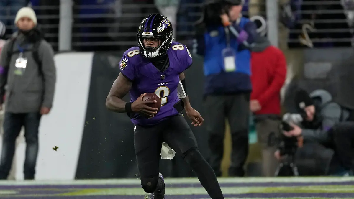 FILE - Baltimore Ravens quarterback Lamar Jackson (8) plays during the second half of the AFC Championship NFL football game against the Kansas City Chiefs, Sunday, Jan. 28, 2024, in Baltimore. The NFL announced Monday, May 13, that the Super Bowl champion Kansas City Chiefs will open the season at home against the Baltimore Ravens on Thursday, Sept. 5. The game is a rematch of the AFC championship game in January, which the Chiefs won 17-10 in Baltimore.(AP Photo/Nick Wass, File)