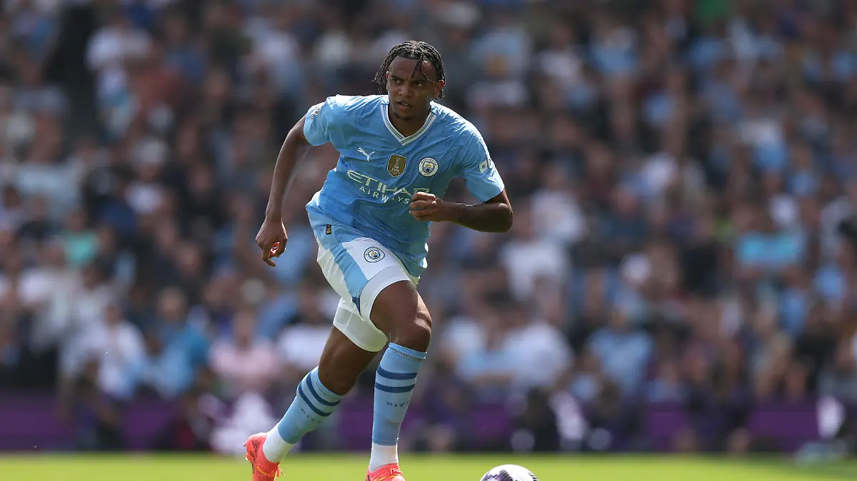 LONDON, ENGLAND - MAY 11: Manuel Akanji of Manchester City in action during the Premier League match between Fulham FC and Manchester City at Craven Cottage on May 11, 2024 in London, England. (Photo by Richard Heathcote/Getty Images)