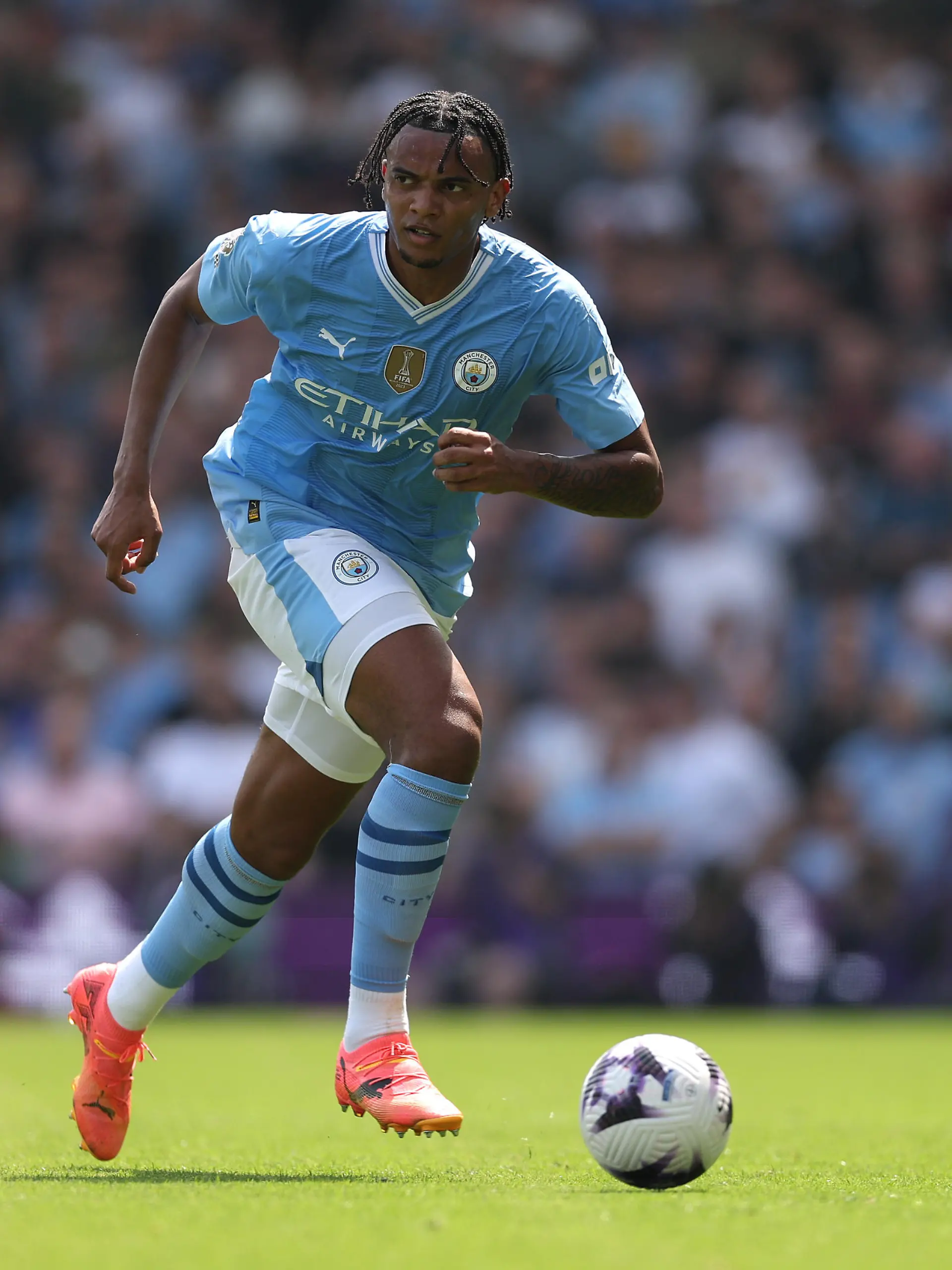 LONDON, ENGLAND - MAY 11: Manuel Akanji of Manchester City in action during the Premier League match between Fulham FC and Manchester City at Craven Cottage on May 11, 2024 in London, England. (Photo by Richard Heathcote/Getty Images)