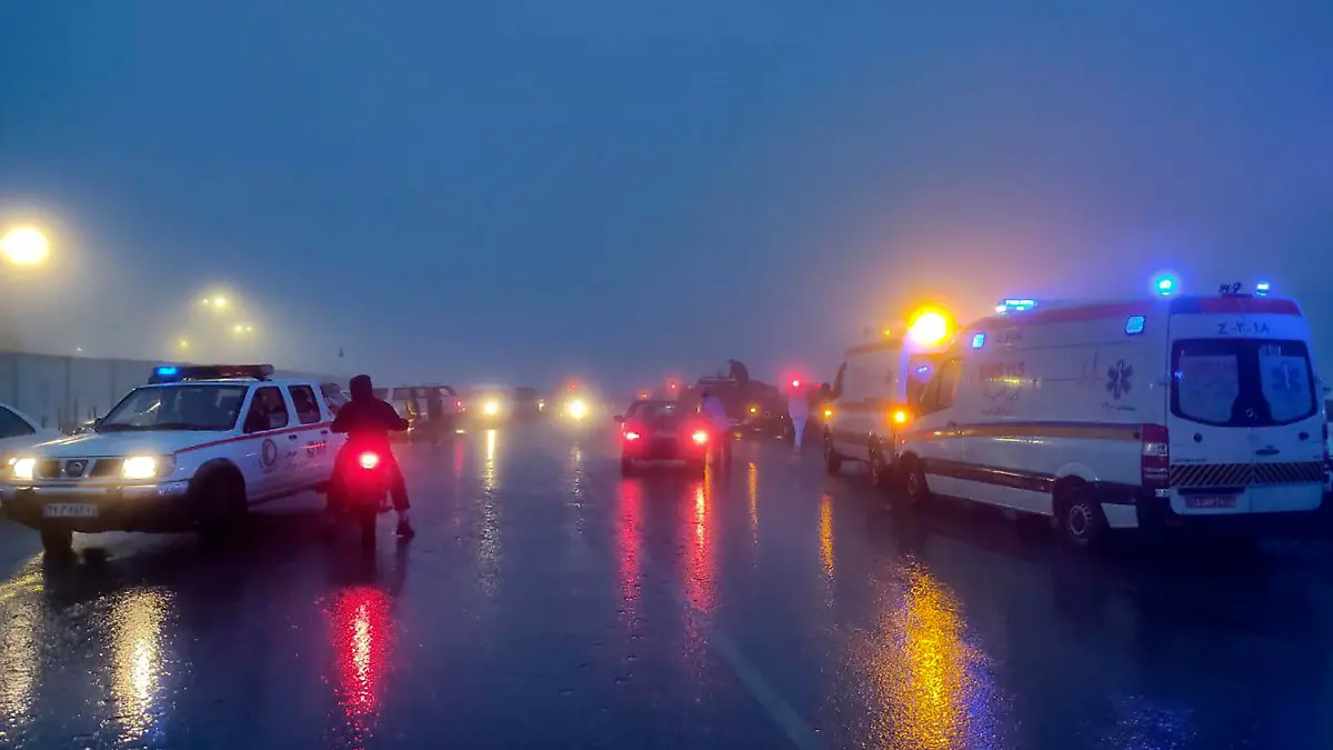 In this photo provided by Moj News Agency, rescue teams' vehicles are seen near the site of the incident of the helicopter carrying Iranian President Ebrahim Raisi in Varzaghan in northwestern Iran, Sunday, May 19, 2024. A helicopter carrying President Raisi, the country's foreign minister and other officials apparently crashed in the mountainous northwest reaches of Iran on Sunday, sparking a massive rescue operation in a fog-shrouded forest as the public was urged to pray. (Azin Haghighi/Moj News Agency via AP)