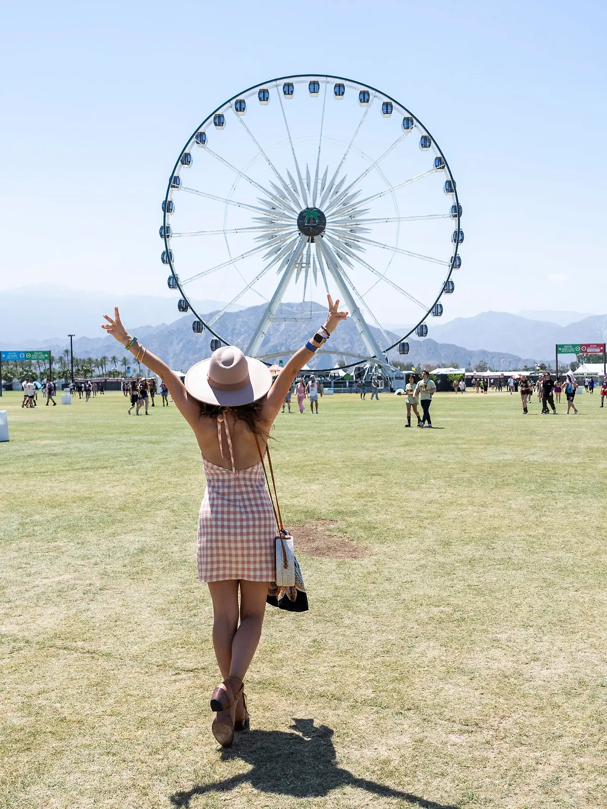 Festivalgoers are seen during the second weekend of the Coachella Valley Music and Arts Festival on Saturday, April 20, 2024, at the Empire Polo Club in Indio, Calif. (Photo by Amy Harris/Invision/AP)