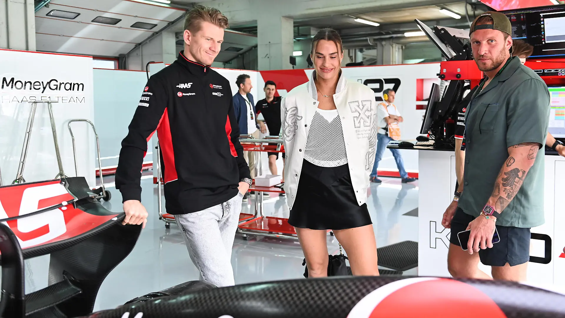 5/19/2024 - Nico Hulkenberg, Haas F1 Team, with guest, star tennis player Aryna Sabalenka during the Formula 1 Emilia Romagna Grand Prix in Imola, Italy. (Photo by Mark Sutton/Motorsport Images/Sipa USA) France OUT, UK OUT