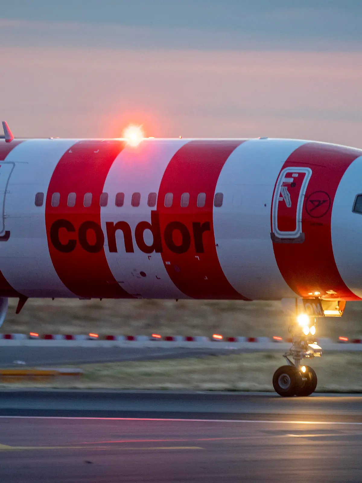 An aircraft of Condor Airlines at the tarmac in Frankfurt's airport, Germany, Friday, July 14, 2023. (AP Photo/Michael Probst)