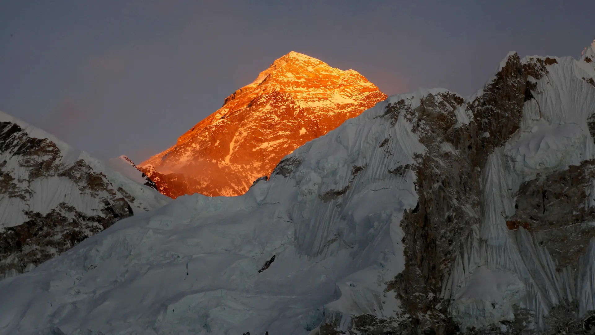 FILE - In this Nov. 12, 2015, file photo, Mt. Everest is seen from the way to Kalapatthar in Nepal. A Kenyan climber attempting to scale the world’s highest mountain has been found dead near the summit. A government official based at the base camp of Mount Everest says the body of Cheruiyot Kirui was found on the mountain. It was unclear when the body would be recovered because it would be difficult to carry at that altitude due to the low oxygen level. (AP Photo/Tashi Sherpa, File)