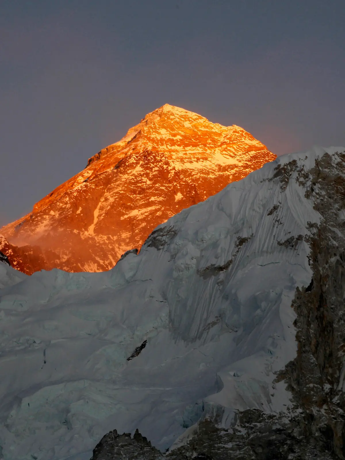 FILE - In this Nov. 12, 2015, file photo, Mt. Everest is seen from the way to Kalapatthar in Nepal. A Kenyan climber attempting to scale the world’s highest mountain has been found dead near the summit. A government official based at the base camp of Mount Everest says the body of Cheruiyot Kirui was found on the mountain. It was unclear when the body would be recovered because it would be difficult to carry at that altitude due to the low oxygen level. (AP Photo/Tashi Sherpa, File)
