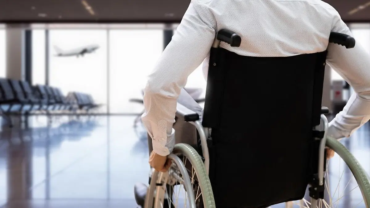 Disabled Adult People Travel In Wheelchair At Airport