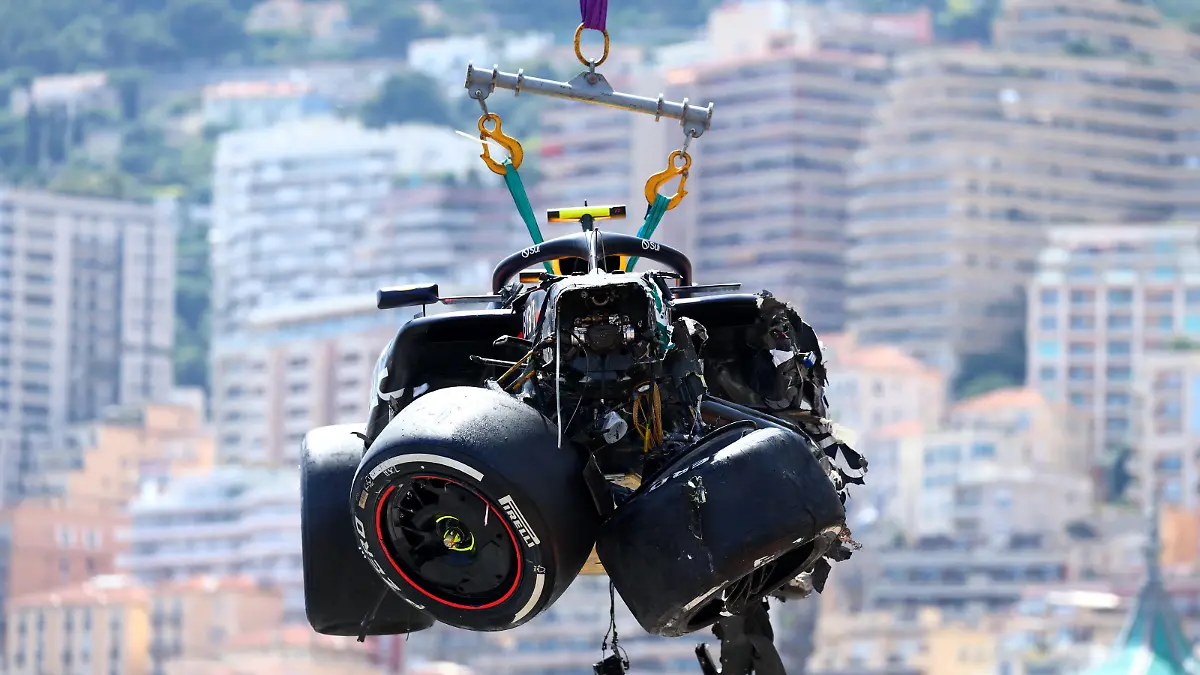 MONTE-CARLO, MONACO - MAY 26: The car of Sergio Perez of Mexico and Oracle Red Bull Racing is recovered from the track after crashing during the F1 Grand Prix of Monaco at Circuit de Monaco on May 26, 2024 in Monte-Carlo, Monaco. (Photo by Clive Rose/Getty Images)
