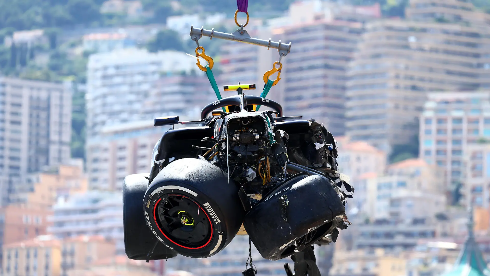 MONTE-CARLO, MONACO - MAY 26: The car of Sergio Perez of Mexico and Oracle Red Bull Racing is recovered from the track after crashing during the F1 Grand Prix of Monaco at Circuit de Monaco on May 26, 2024 in Monte-Carlo, Monaco. (Photo by Clive Rose/Getty Images)
