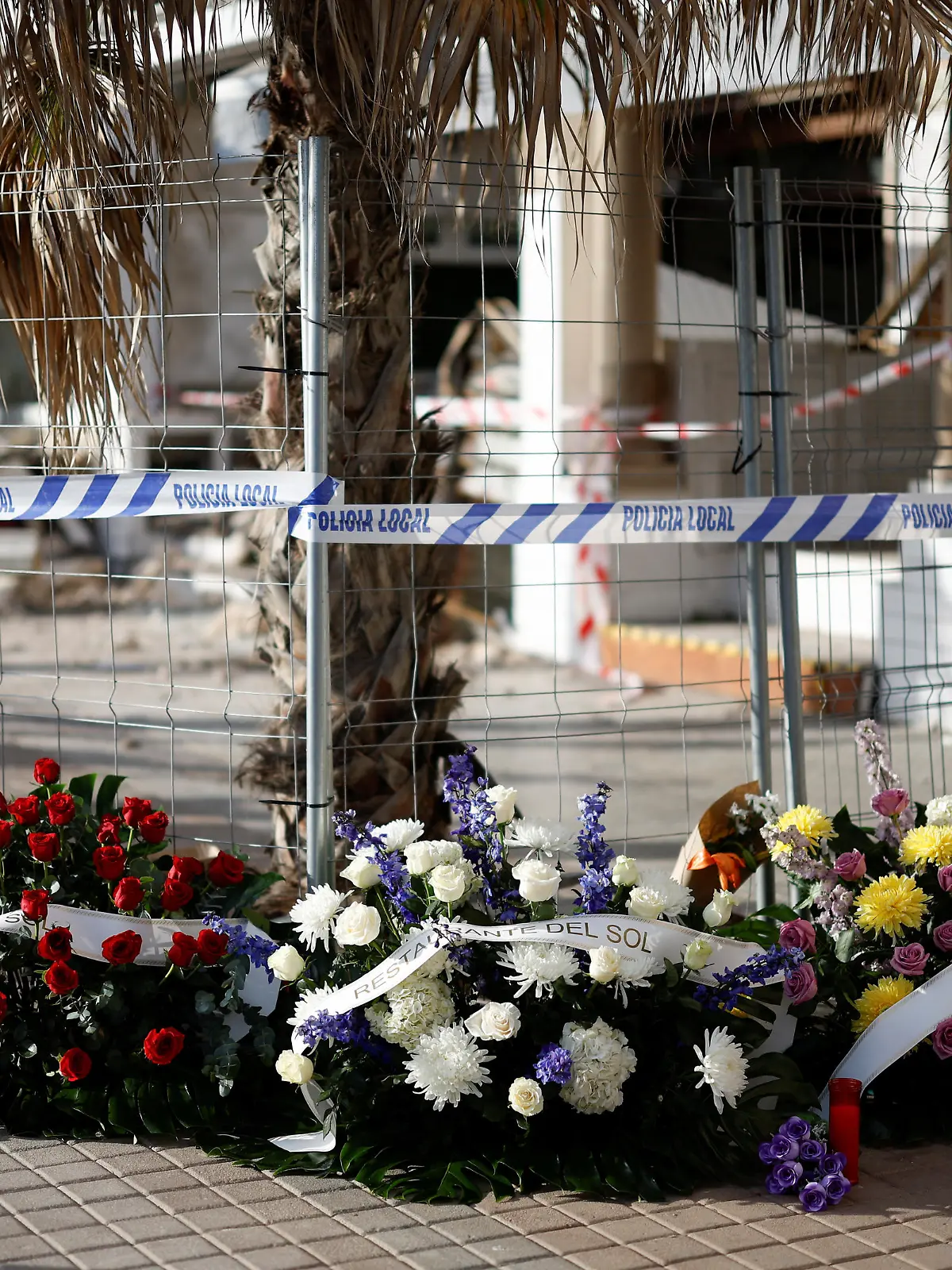 Wreaths in tribute to the victims of the Medusa Beach Club building collapse lie on the ground, in Palma de Mallorca, Spain, May 24, 2024. REUTERS/Juan Medina