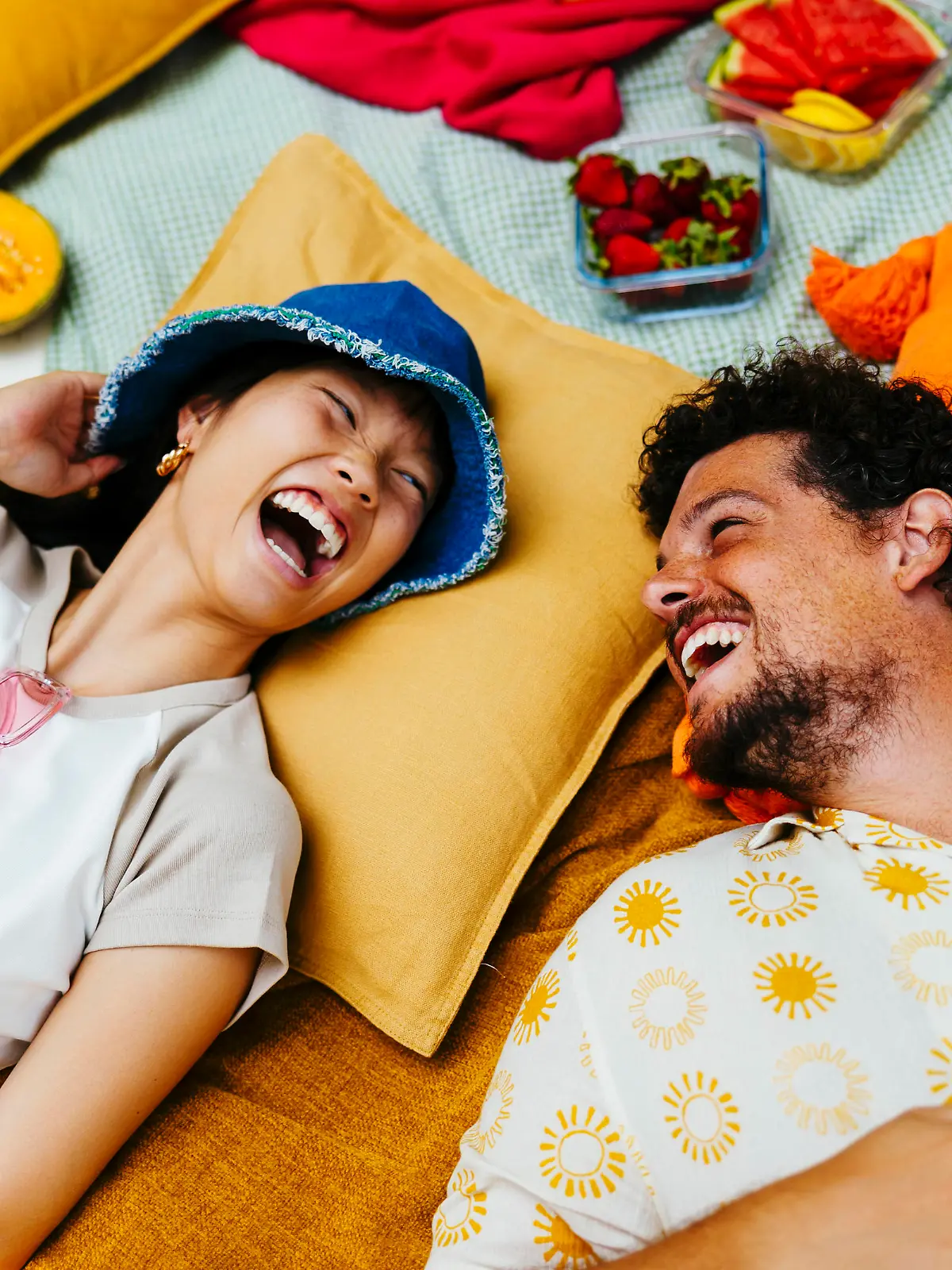 Happy friends enjoying together and lying on picnic blanket model released, Symbolfoto, EBSF03762