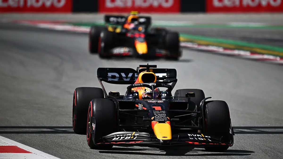 BARCELONA, SPAIN - MAY 22: Max Verstappen of the Netherlands driving the (1) Oracle Red Bull Racing RB18 leads Sergio Perez of Mexico driving the (11) Oracle Red Bull Racing RB18 during the F1 Grand Prix of Spain at Circuit de Barcelona-Catalunya on May 22, 2022 in Barcelona, Spain. (Photo by Clive Mason/Getty Images)