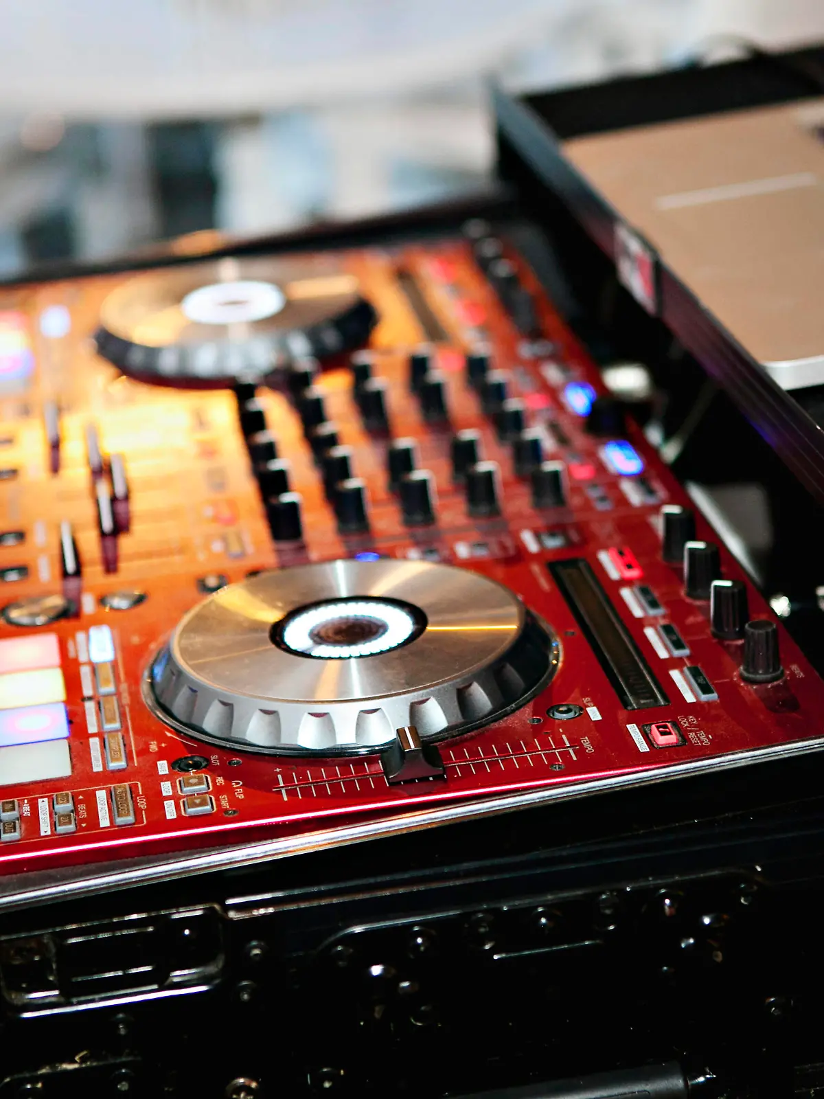 Sleek DJ mixer with glowing lights ready for music mixing. Palm Springs, California, United States R_XPKR240426G-1413049-01
