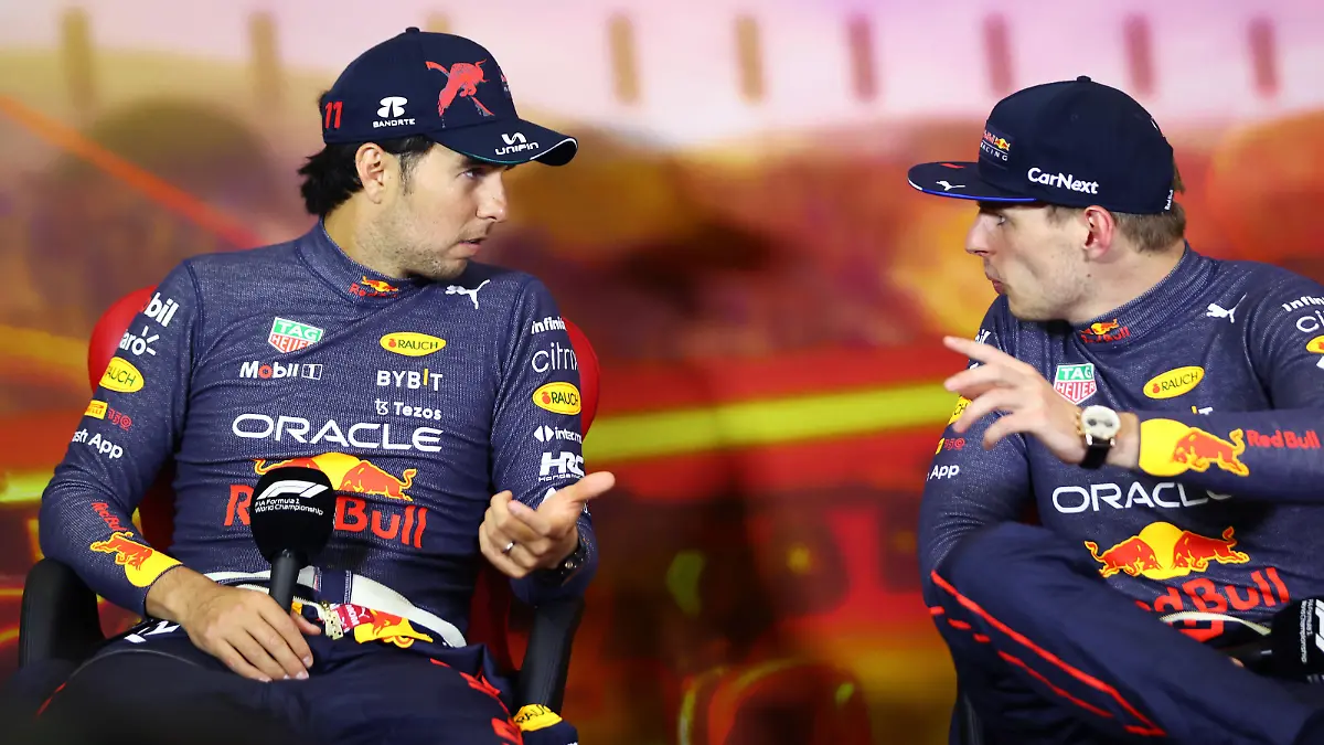BARCELONA, SPAIN - MAY 22: Race winner Max Verstappen of the Netherlands and Oracle Red Bull Racing and Second placed Sergio Perez of Mexico and Oracle Red Bull Racing talk in the press conference after the F1 Grand Prix of Spain at Circuit de Barcelona-Catalunya on May 22, 2022 in Barcelona, Spain. (Photo by Dan Istitene/Getty Images)