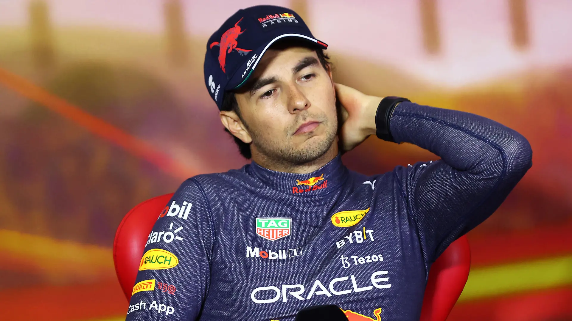 BARCELONA, SPAIN - MAY 22: Second placed Sergio Perez of Mexico and Oracle Red Bull Racing looks on in the press conference after the F1 Grand Prix of Spain at Circuit de Barcelona-Catalunya on May 22, 2022 in Barcelona, Spain. (Photo by Dan Istitene/Getty Images)