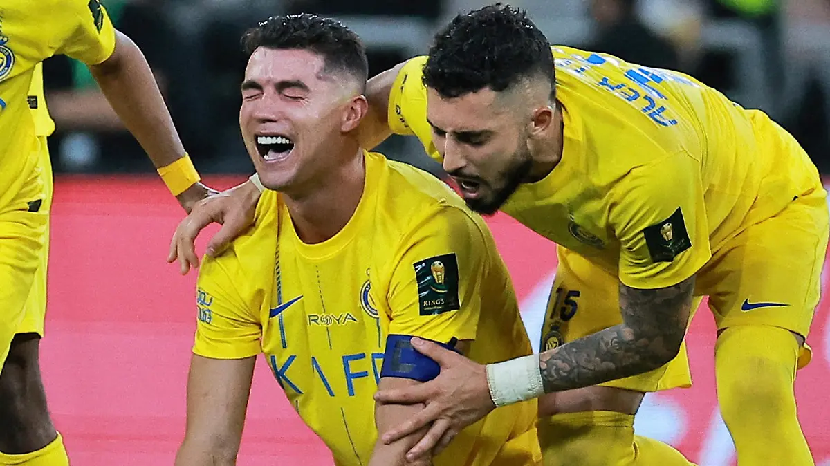 Soccer Football - Saudi King Cup - Final - Al Hilal v Al Nassr - King Abdullah Sport City, Jeddah, Saudi Arabia - June 1, 2024 Al Nassr's Cristiano Ronaldo, Alex Telles and Abdulrahman Ghareeb look dejected after losing the penalty shootout and the Saudi King Cup final REUTERS/Stringer TPX IMAGES OF THE DAY