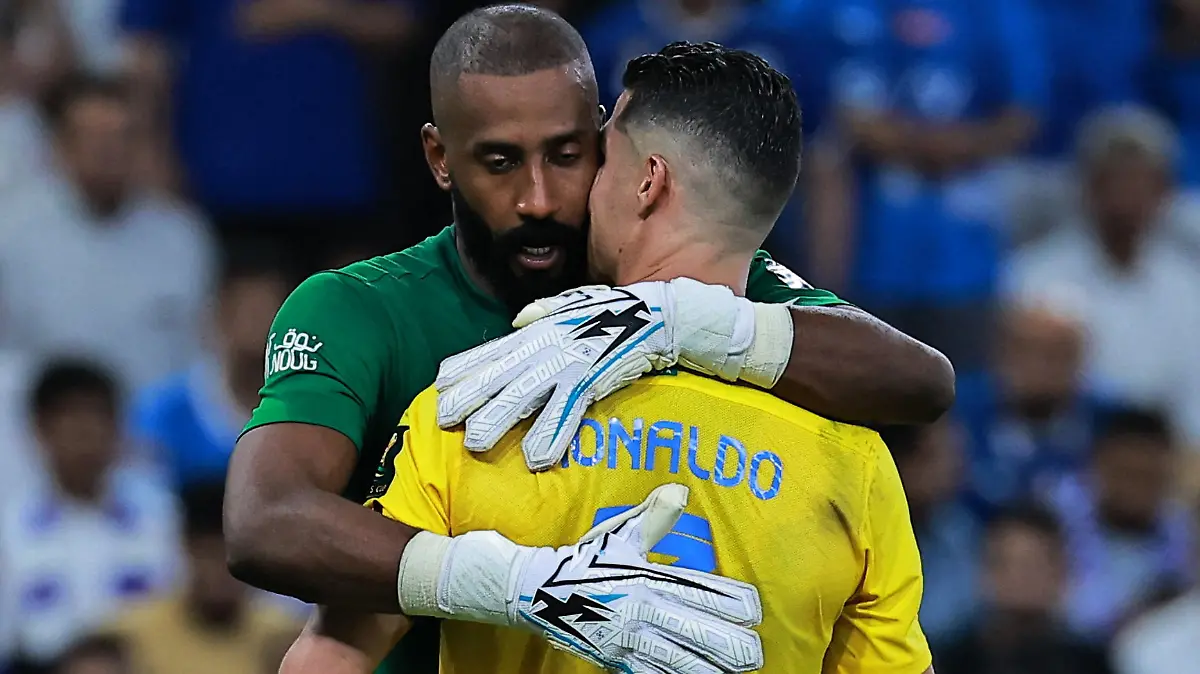 Soccer Football - Saudi King Cup - Final - Al Hilal v Al Nassr - King Abdullah Sport City, Jeddah, Saudi Arabia - May 31, 2024 Al Nassr's Cristiano Ronaldo with Waleed Abdullah during the penalty shootout REUTERS/Stringer
