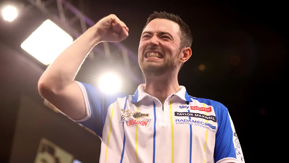 LEEDS, ENGLAND - MAY 09: Luke Humphries of England celebrates victory following the Final match between Luke Humphries of England and Michael van Gerwen of Netherlands on Night 15 of the 2024 BetMGM Premier League Darts at First Direct Arena on May 09, 2024 in Leeds, England. (Photo by George Wood/Getty Images)