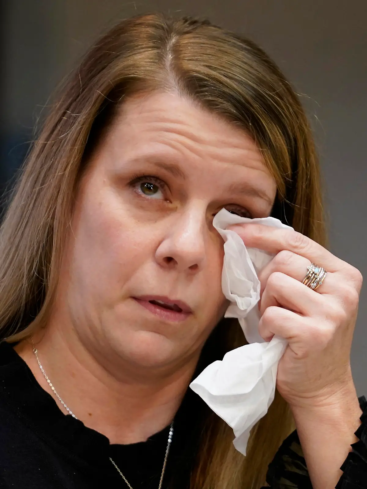 FILE - Gabby Petito's mother Nichole Schmidt, wipes a tear from her face during a news conference on Nov. 3, 2022, in Salt Lake City. A letter written by Roberta Laundrie to her late son Brian Laundrie can be used by the attorney for Gabby Petito’s parents in preparation for their negligence lawsuit filed against Laundrie’s parents and their New York-based attorney in their high-profile case involving Petito’s death. (AP Photo/Rick Bowmer, File)