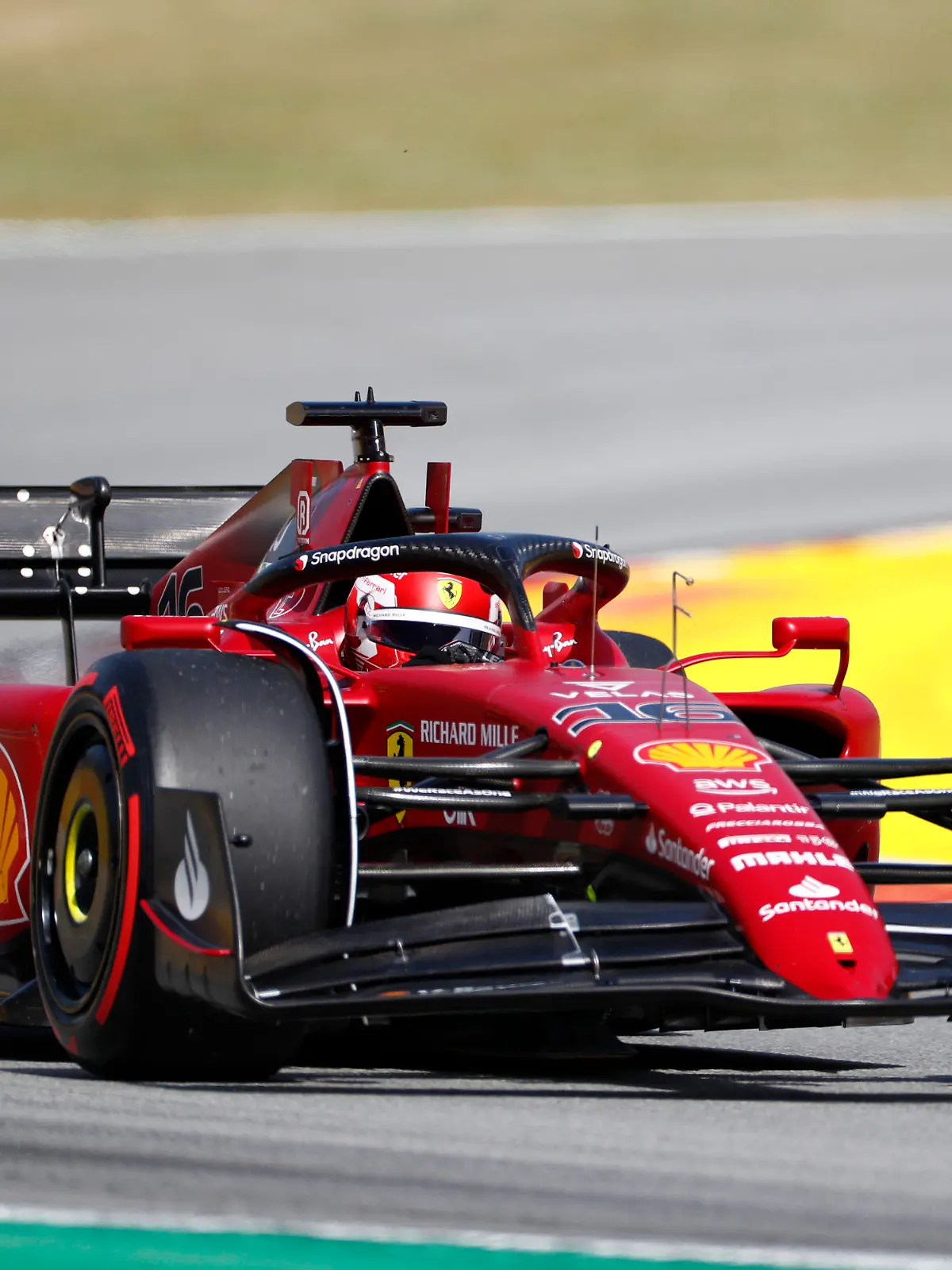 Ferrari driver Charles Leclerc of Monaco steers his car during qualifying session at the Barcelona Catalunya racetrack in Montmelo, Spain, Saturday, May 21, 2022. The Formula One race will be held on Sunday. (AP Photo/Joan Monfort)