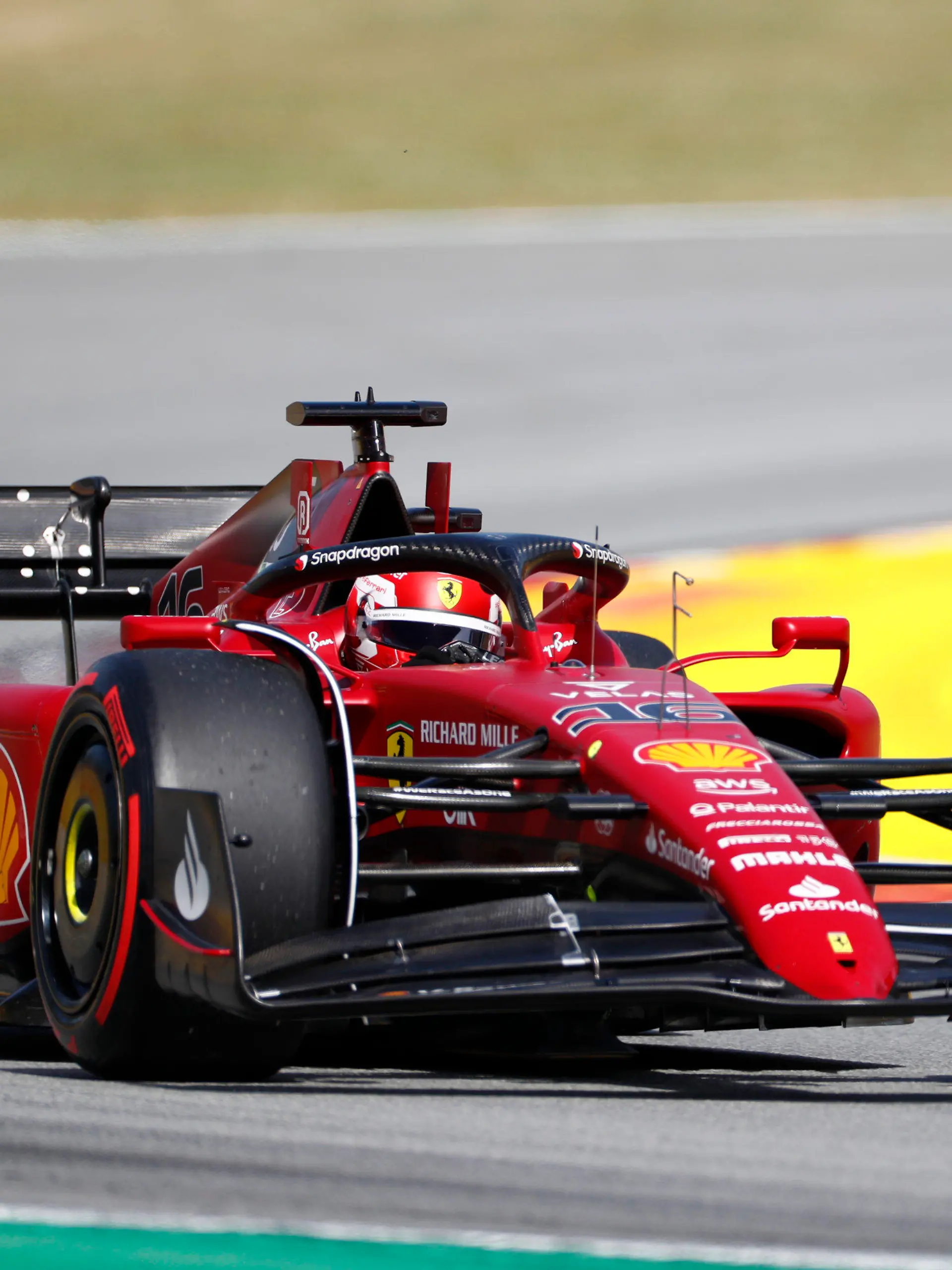 Ferrari driver Charles Leclerc of Monaco steers his car during qualifying session at the Barcelona Catalunya racetrack in Montmelo, Spain, Saturday, May 21, 2022. The Formula One race will be held on Sunday. (AP Photo/Joan Monfort)