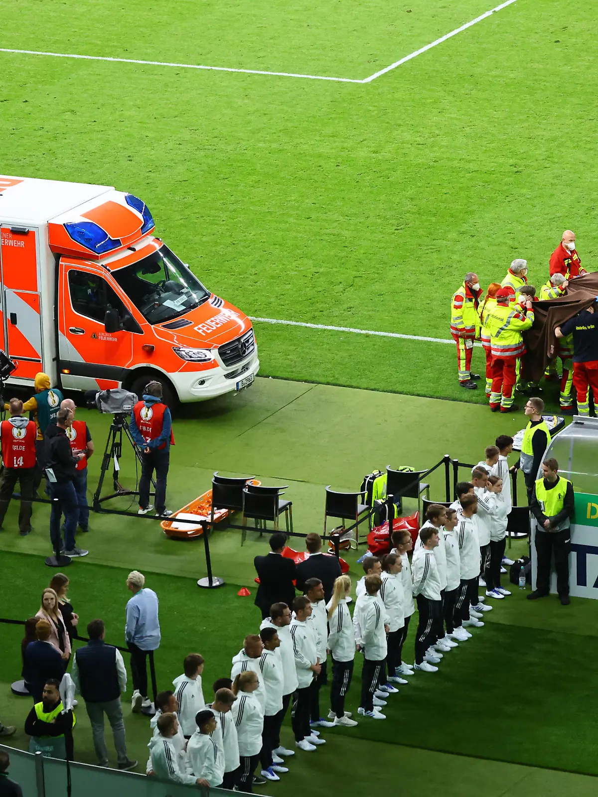 Soccer Football - DFB Cup - Final - SC Freiburg v RB Leipzig - Olympiastadion, Berlin, Germany - May 21, 2022  A person receives medical attention after the match REUTERS/Fabrizio Bensch DFB REGULATIONS PROHIBIT ANY USE OF PHOTOGRAPHS AS IMAGE SEQUENCES AND/OR QUASI-VIDEO.