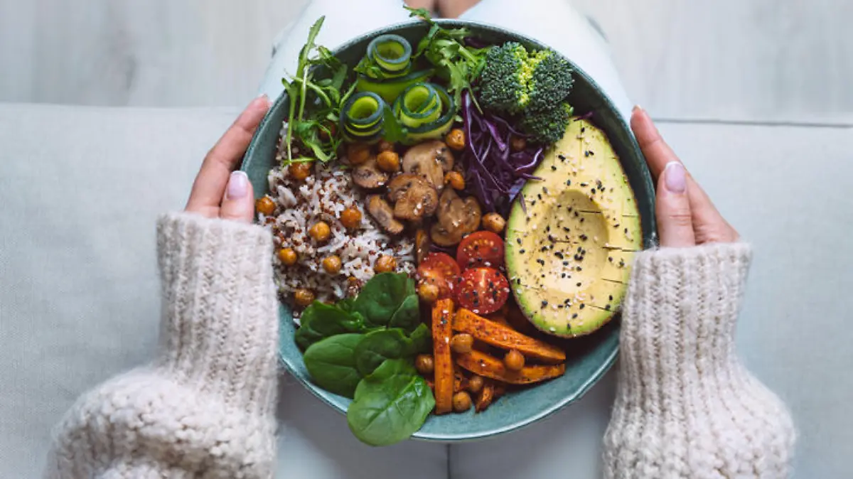 Healthy eating. Plate with vegan or vegetarian food. Healthy plant based diet. Healthy dinner. Buddha bowl with fresh vegetables. High quality photo