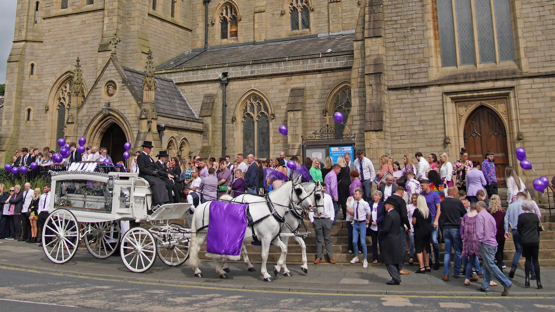 Katie Kenyon funeral. A horse drawn hearse arrives for the funeral of murdered mother of two Katie Kenyon, whose body was found in the Forest of Gisburn, six days after she went missing, at St Leonard's Church, Padiham, near Burnley in Lancashire. Picture date: Friday May 20, 2022. See PA story FUNERAL Kenyon. Photo credit should read: Peter Byrne/PA Wire URN:66994783