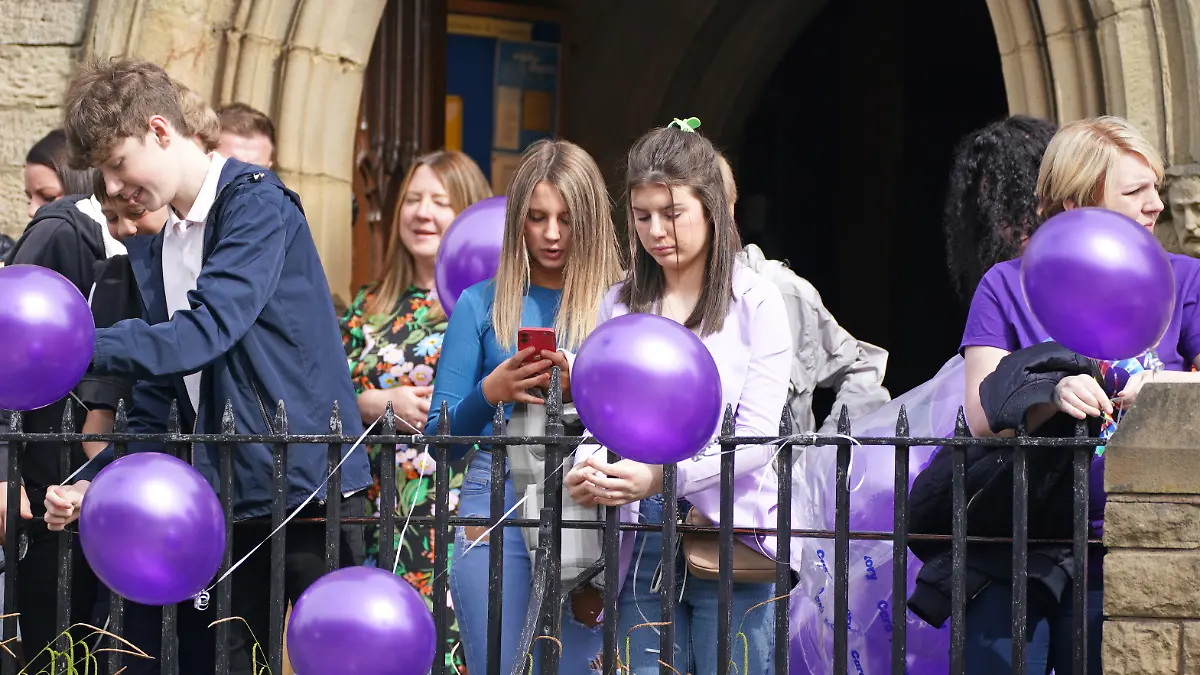 Katie Kenyon funeral. Mourners arrive for the funeral of murdered mother of two Katie Kenyon, whose body was found in the Forest of Gisburn, six days after she went missing, at St Leonard's Church, Padiham, near Burnley in Lancashire. Picture date: Friday May 20, 2022. See PA story FUNERAL Kenyon. Photo credit should read: Peter Byrne/PA Wire URN:66994430