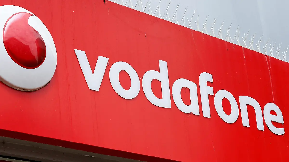 The logo of Vodafone is seen at a Vodafone store in Northwich, Cheshire, Britain, June 7, 2023. REUTERS/Jason Cairnduff