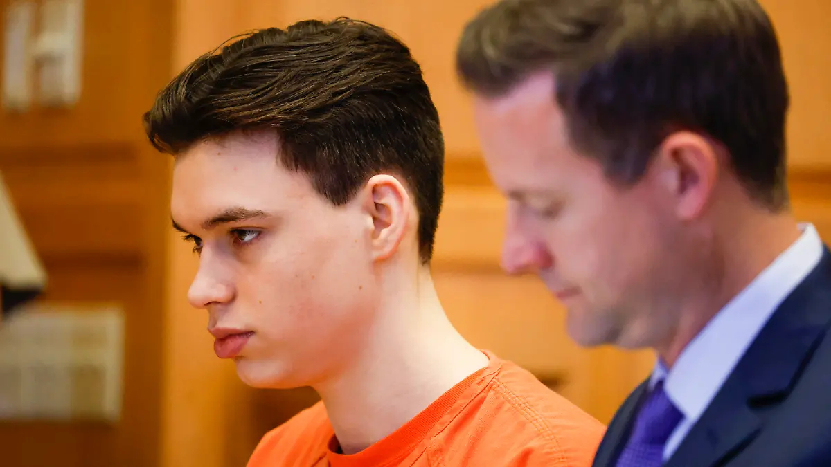 Willard Miller sits with his attorneys during his sentence hearing at the Jefferson County Courthouse in Fairfield, Iowa, Thursday, July 6, 2023. Miller, the first of two Iowa teenagers who pleaded guilty to beating their high school Spanish teacher to death with a baseball bat, was sentenced Thursday to life with a possibility of parole after 35 years in prison. (Jim Slosiarek/The Gazette via AP, Pool)