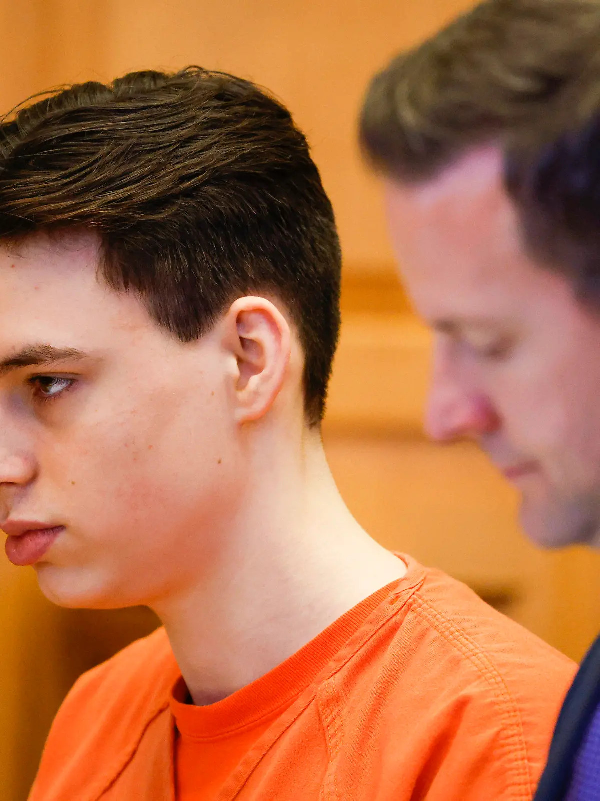 Willard Miller sits with his attorneys during his sentence hearing at the Jefferson County Courthouse in Fairfield, Iowa, Thursday, July 6, 2023. Miller, the first of two Iowa teenagers who pleaded guilty to beating their high school Spanish teacher to death with a baseball bat, was sentenced Thursday to life with a possibility of parole after 35 years in prison. (Jim Slosiarek/The Gazette via AP, Pool)