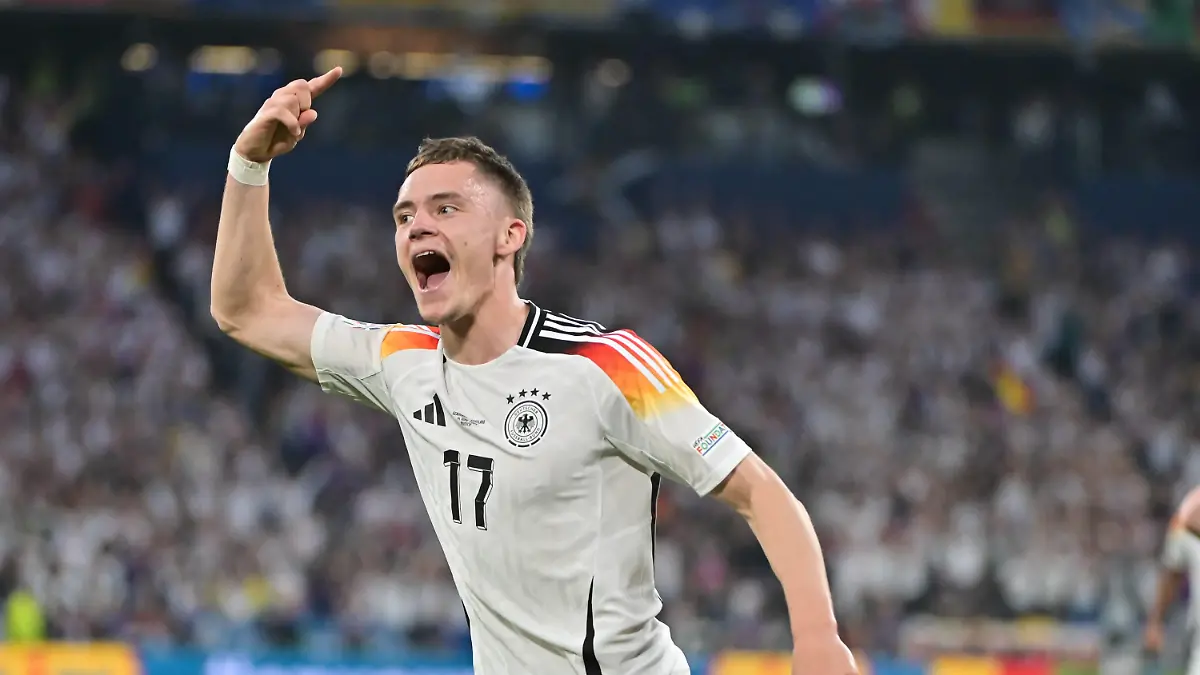 Bild zeigt: Torjubel Deutschland, Florian Wirtz 17, Deutschland, 14.06.2024, München, Fussball, Europameisterschaft, Deutschland - Schottland, EVENT REGULATIONS PROHIBIT ANY USE OF PHOTOGRAPHS AS IMAGE SEQUENCES AND/OR QUASI-VIDEO. *** Picture shows goal celebration Germany, Florian Wirtz 17, Germany , 14 06 2024, Munich, Soccer, European Championship, Germany Scotland, EVENT REGULATIONS PROHIBIT ANY USE OF PHOTOGRAPHS AS IMAGE SEQUENCES AND OR QUASI VIDEO xklx