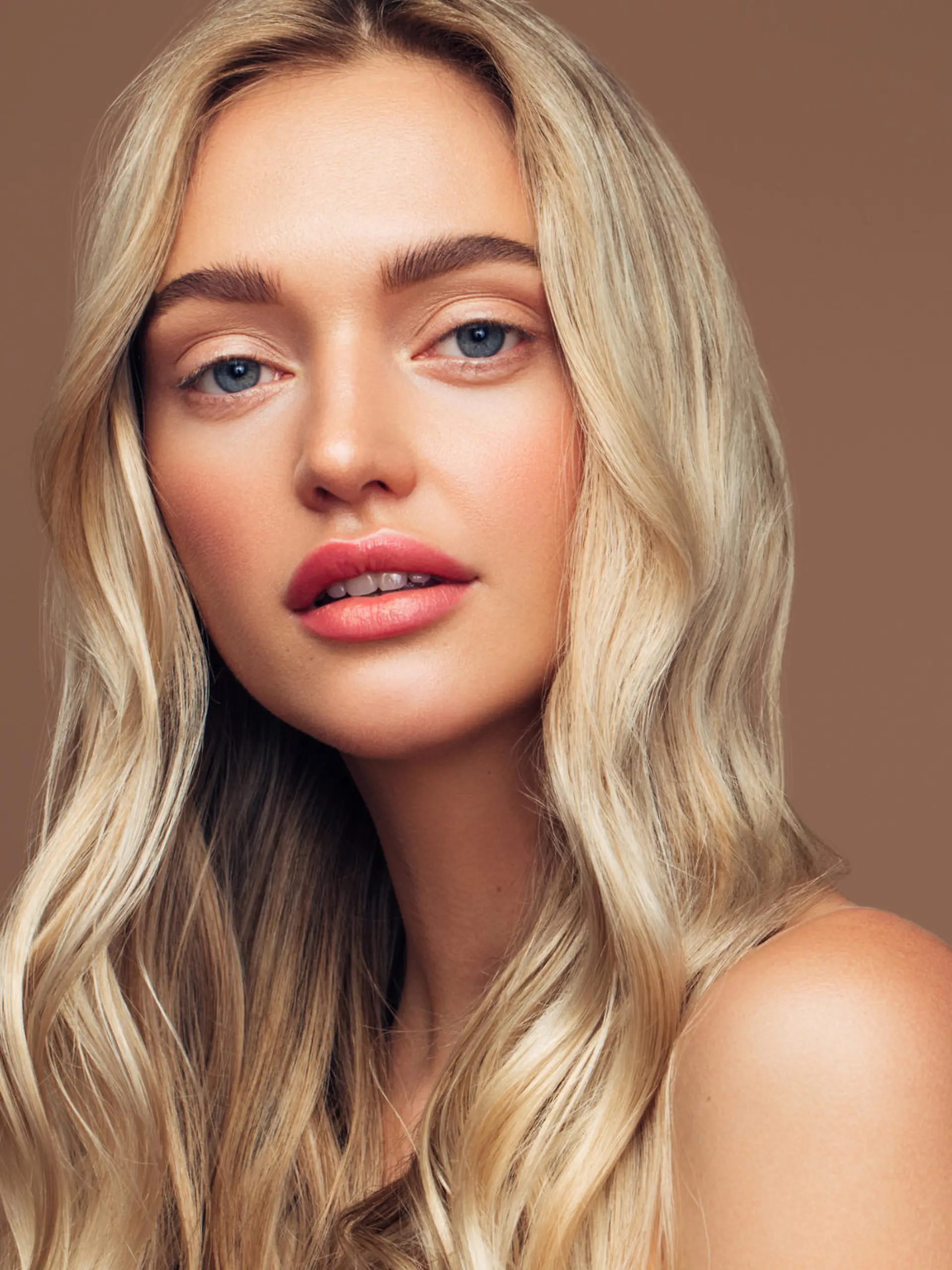 Portrait of young girl with clean skin and soft makeup