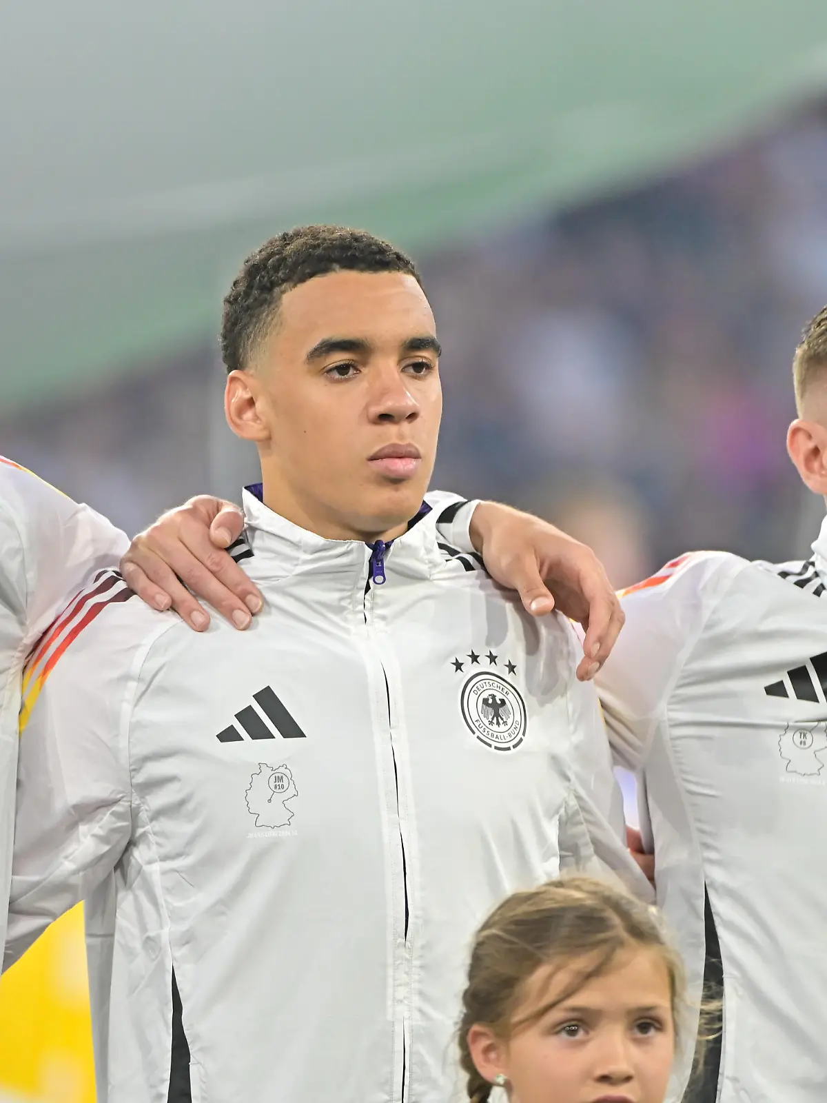 Bild zeigt: deutsche Nationalmannschaft bei der Nationalhymne, 14.06.2024, München, Fussball, Europameisterschaft, Deutschland - Schottland, EVENT REGULATIONS PROHIBIT ANY USE OF PHOTOGRAPHS AS IMAGE SEQUENCES AND/OR QUASI-VIDEO.