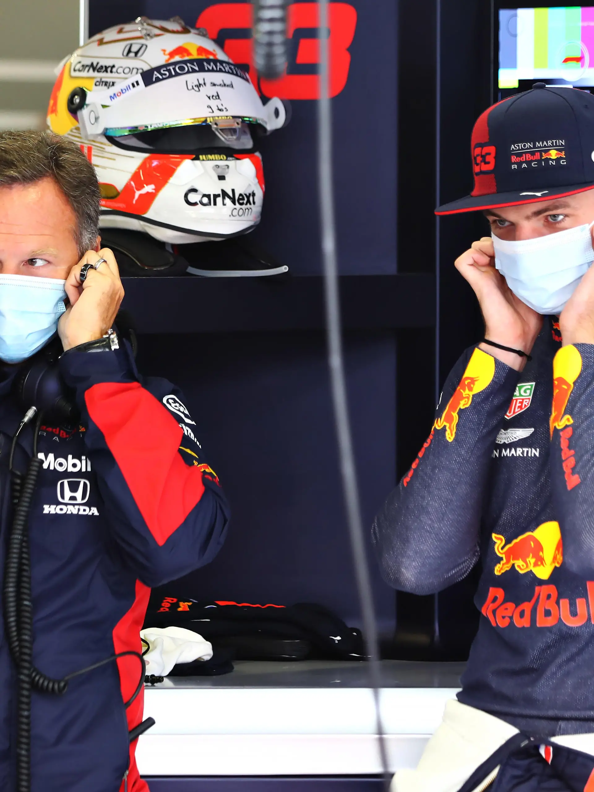 SPIELBERG, AUSTRIA - JULY 03: Max Verstappen of Netherlands and Red Bull Racing and Red Bull Racing Team Principal Christian Horner look on in the garage during practice for the F1 Grand Prix of Austria at Red Bull Ring on July 03, 2020 in Spielberg, Austria. (Photo by Getty Images/Getty Images)