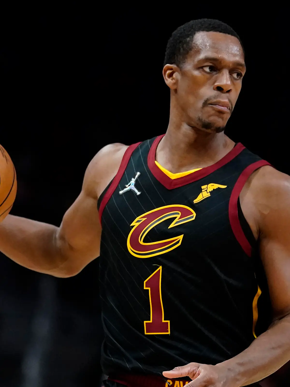 Cleveland Cavaliers guard Rajon Rondo (1) is shown against the Atlanta Hawks during the second half of an NBA basketball game Tuesday, Feb. 15, 2022, in Atlanta. (AP Photo/John Bazemore)