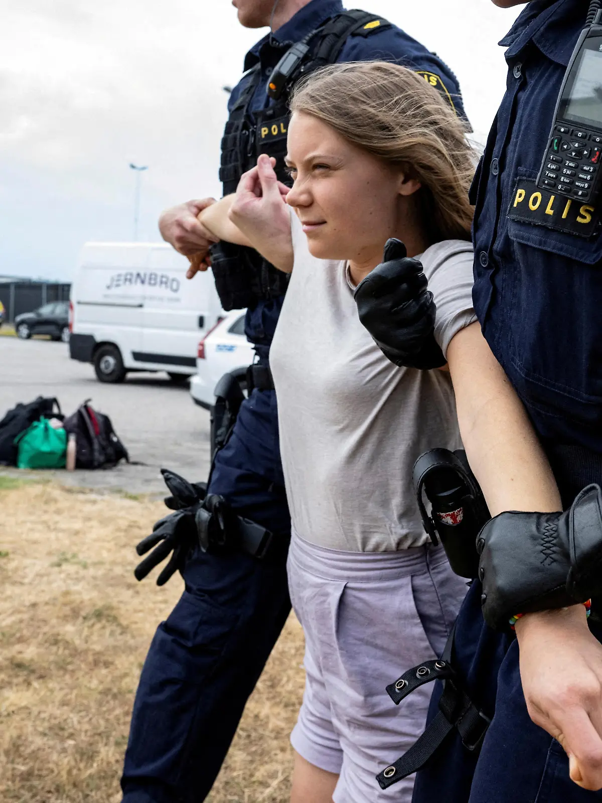 FILE PHOTO: Police remove Greta Thunberg as they move climate activists from the organization Ta Tillbaka Framtiden, who are blocking the entrance to Oljehamnen in Malmo, Sweden, June 19, 2023. TT News Agency/Johan Nilsson via REUTERS/File Photo