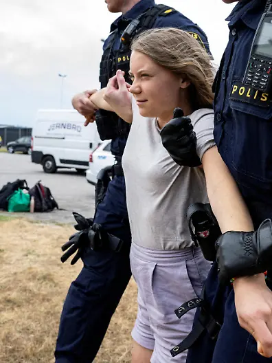 FILE PHOTO: Police remove Greta Thunberg as they move climate activists from the organization Ta Tillbaka Framtiden, who are blocking the entrance to Oljehamnen in Malmo, Sweden, June 19, 2023. TT News Agency/Johan Nilsson via REUTERS/File Photo